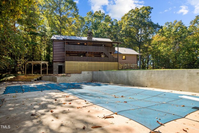 view of pool with a patio