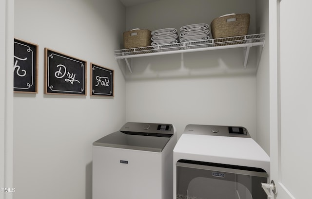 laundry area with washer and dryer