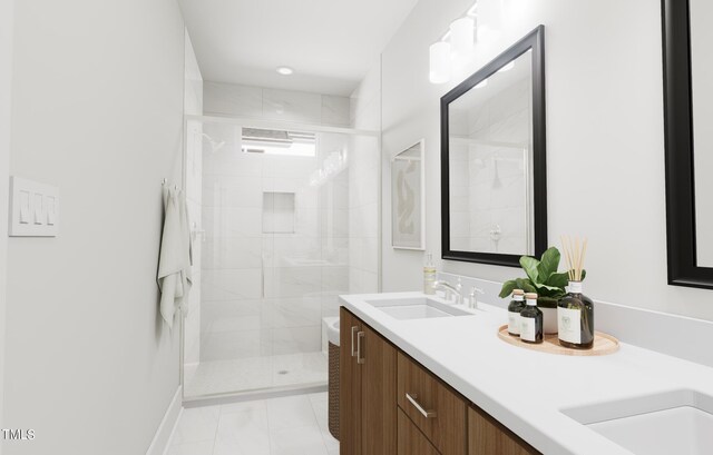 bathroom featuring vanity, tile patterned floors, and walk in shower