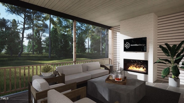 sunroom / solarium with a fireplace