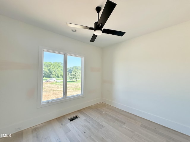 280 Forest Bridge Rd, Youngsville, NC 27596 - spare room featuring light wood-style flooring and ceiling fan