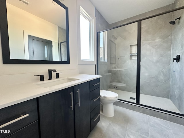 280 Forest Bridge Rd, Youngsville, NC 27596 - bathroom with vanity, a shower stall, and tile patterned flooring
