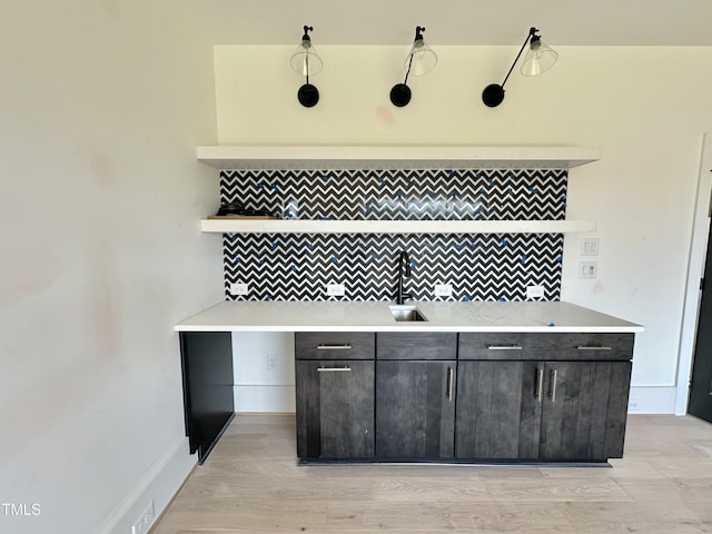 280 Forest Bridge Rd, Youngsville, NC 27596 - bar area with decorative backsplash and light wood finished floors
