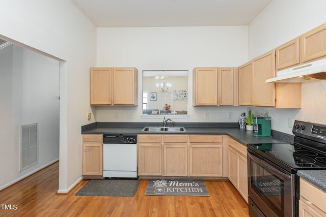 kitchen with an inviting chandelier, light wood-type flooring, sink, dishwasher, and black electric range