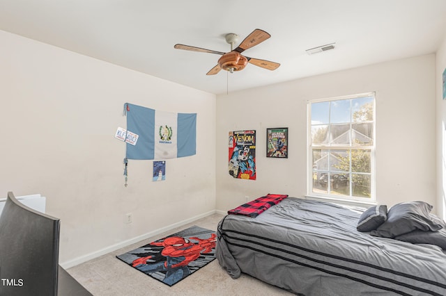 carpeted bedroom featuring ceiling fan