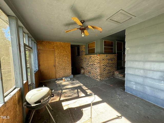 interior space featuring ceiling fan