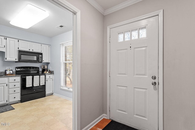 entrance foyer featuring ornamental molding