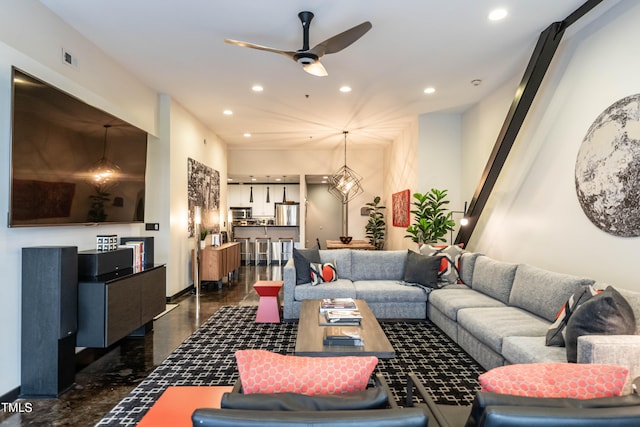 living room featuring ceiling fan