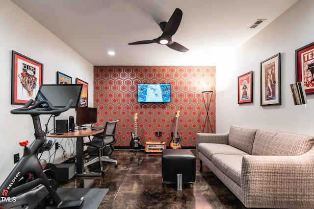 office featuring concrete floors and ceiling fan