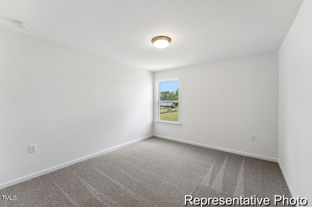 unfurnished room featuring carpet floors