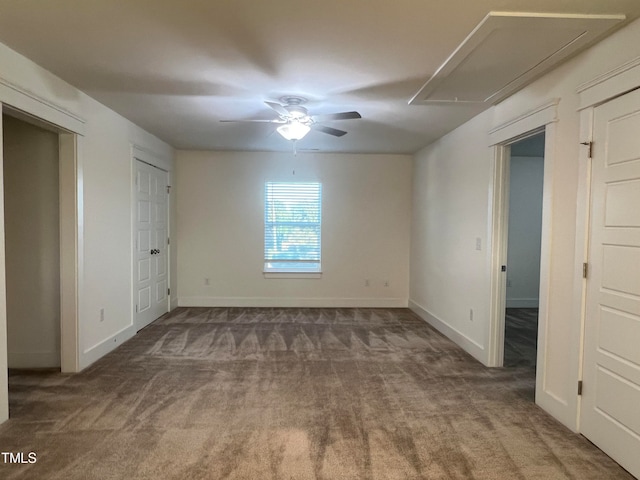 unfurnished bedroom featuring carpet and ceiling fan