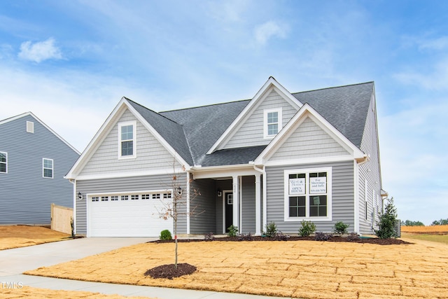 craftsman-style home with a garage