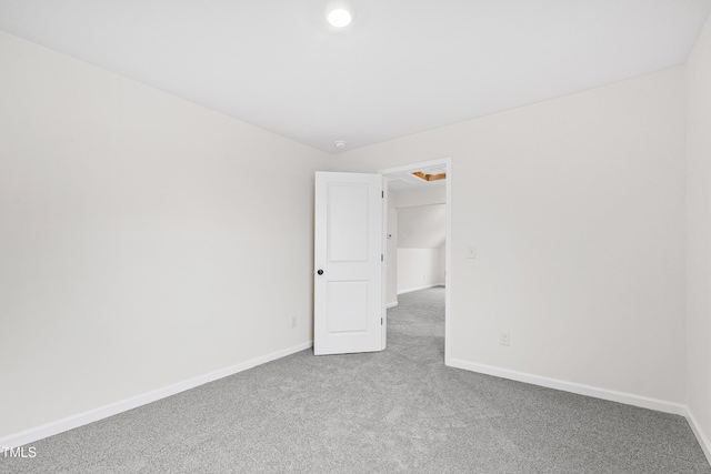 unfurnished room featuring carpet floors