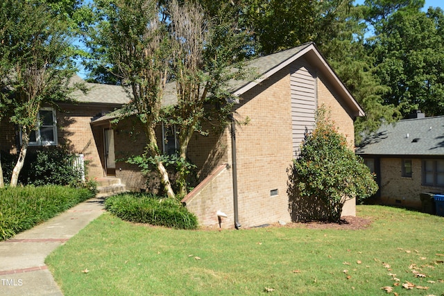 view of property exterior featuring a yard