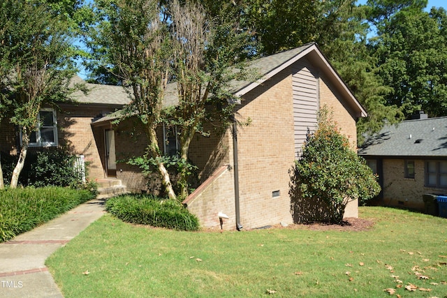 500 W Woodcroft Pkwy Unit 8C, Durham, NC 27713 - view of property exterior with crawl space, a yard, and brick siding