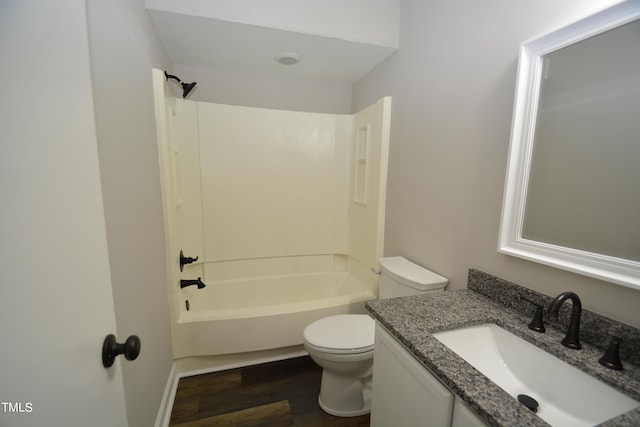 500 W Woodcroft Pkwy Unit 8C, Durham, NC 27713 - bathroom with washtub / shower combination, wood finished floors, toilet, and vanity