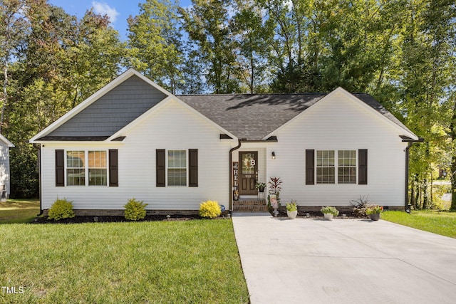 single story home with a front lawn