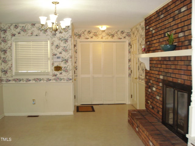 unfurnished dining area featuring a notable chandelier