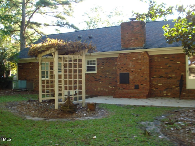 back of property with a patio area