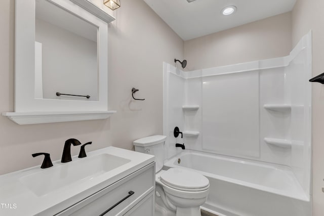 full bath with toilet, vanity, and  shower combination