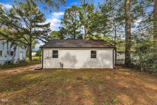 view of home's exterior featuring a yard