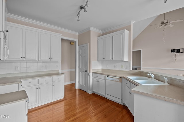 kitchen featuring ceiling fan, white cabinets, sink, white appliances, and light hardwood / wood-style flooring