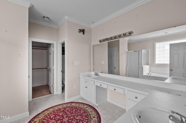 bathroom with tile patterned flooring, crown molding, vanity, and separate shower and tub