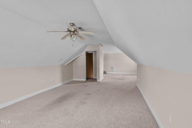 3806 Wyattwood Dr N, Wilson, NC 27896 - bonus room with visible vents, baseboards, a ceiling fan, light colored carpet, and lofted ceiling