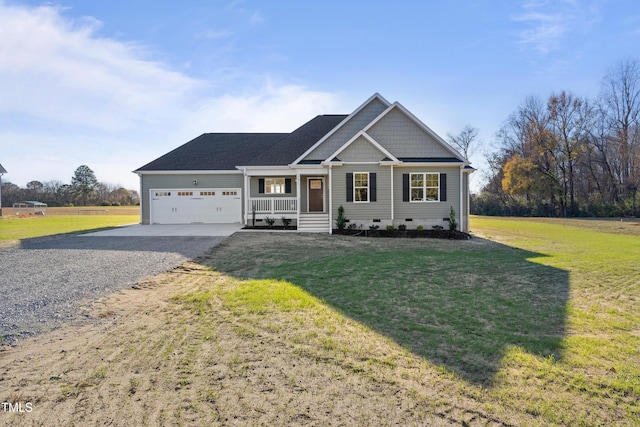 view of front of home with a porch, a garage, and a front lawn