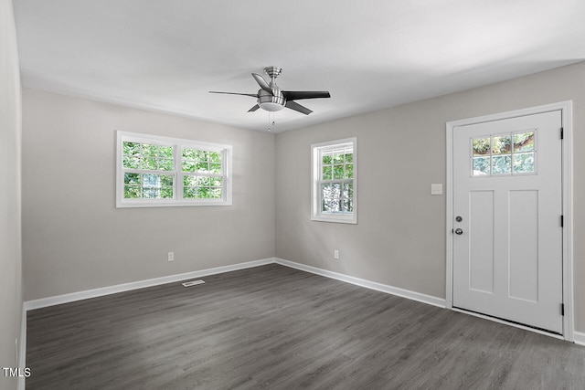 entrance foyer with dark wood-type flooring and ceiling fan