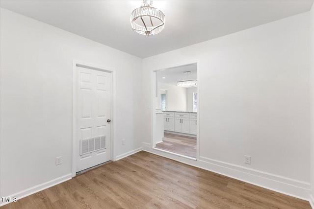 empty room featuring light hardwood / wood-style flooring