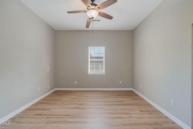 unfurnished room with ceiling fan and light hardwood / wood-style flooring