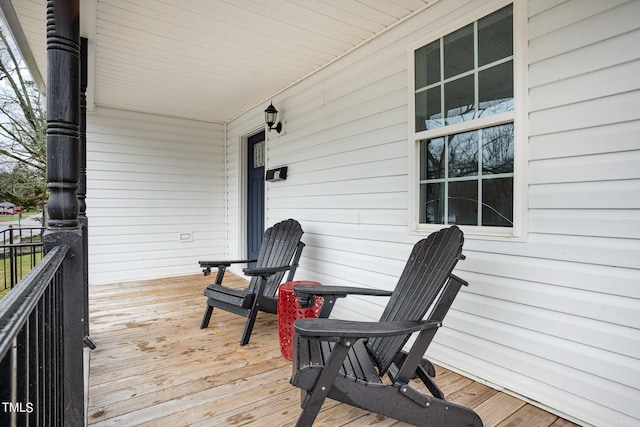 deck featuring covered porch