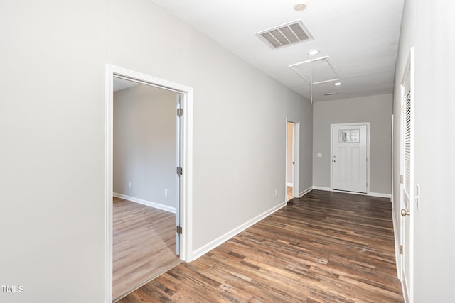 hallway featuring dark wood-type flooring