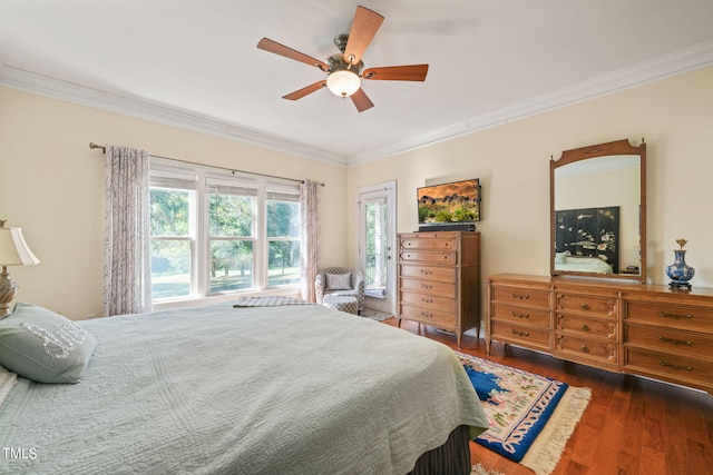 bedroom featuring ornamental molding, dark hardwood / wood-style floors, and ceiling fan