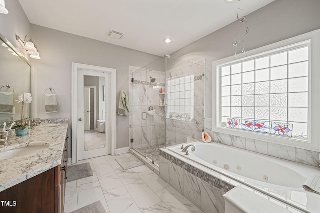 bathroom with vanity and plus walk in shower