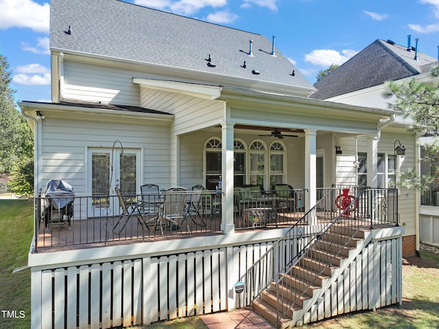 rear view of house featuring ceiling fan