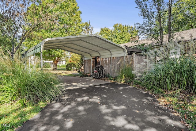 view of car parking with a carport