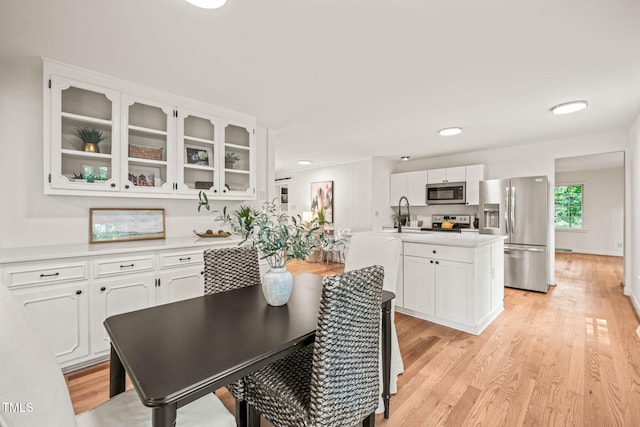 3006 Pump Station Ln, Durham, NC 27712 - dining room with light wood-style floors and recessed lighting