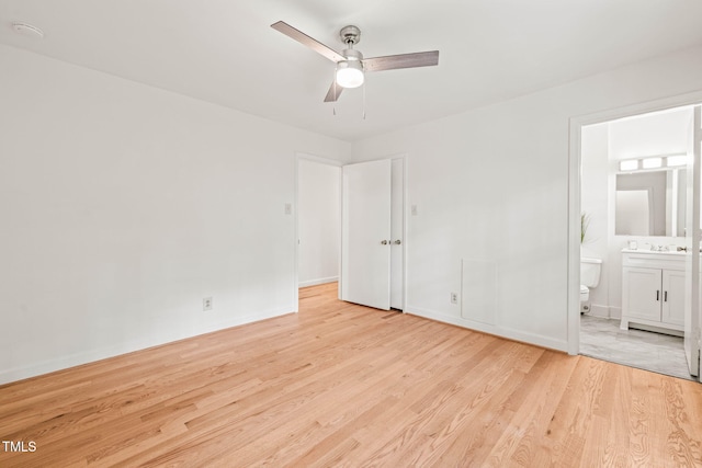 3006 Pump Station Ln, Durham, NC 27712 - unfurnished bedroom with light wood-style flooring, connected bathroom, and ceiling fan