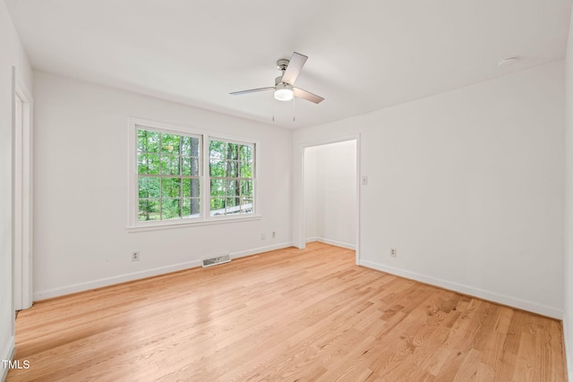 3006 Pump Station Ln, Durham, NC 27712 - empty room with light wood-type flooring and ceiling fan