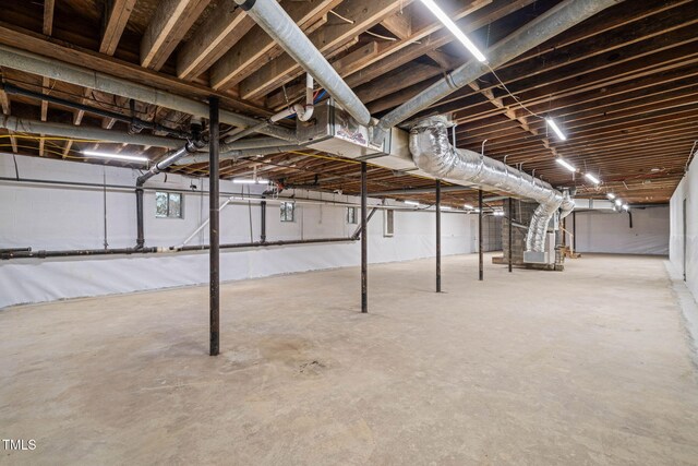 3006 Pump Station Ln, Durham, NC 27712 - unfinished below grade area featuring heating unit