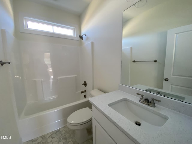 bathroom featuring shower / washtub combination, vanity, and toilet