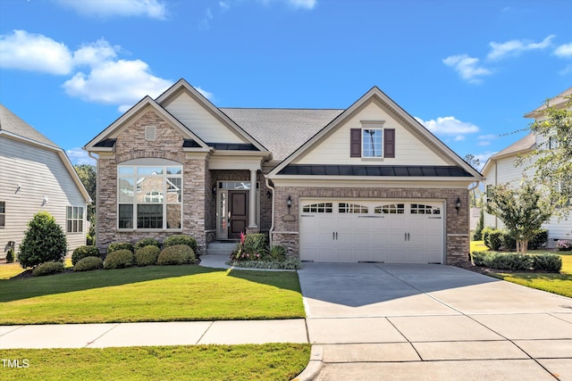 craftsman inspired home with a garage and a front yard