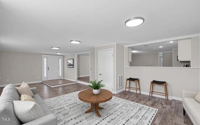 4193 Ji Oakes Rd, Bullock, NC 27507 - living area featuring wood finished floors and baseboards