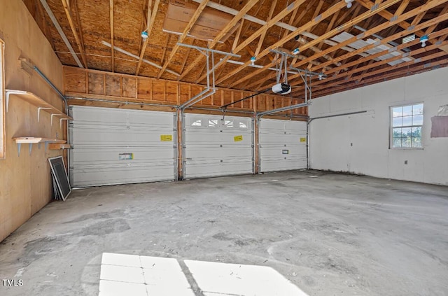 4193 Ji Oakes Rd, Bullock, NC 27507 - garage featuring a garage door opener