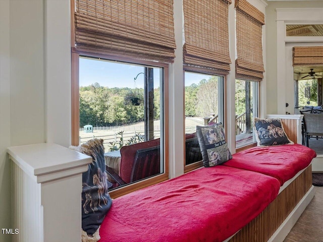 bedroom featuring tile patterned floors and multiple windows