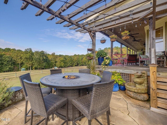 view of patio featuring a pergola and ceiling fan