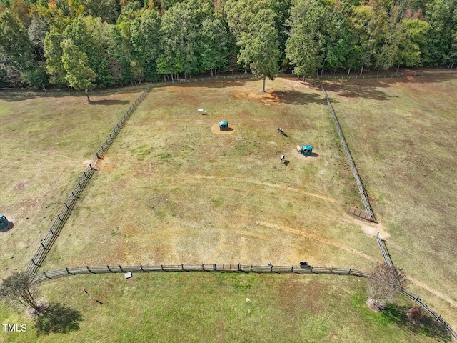 birds eye view of property featuring a rural view