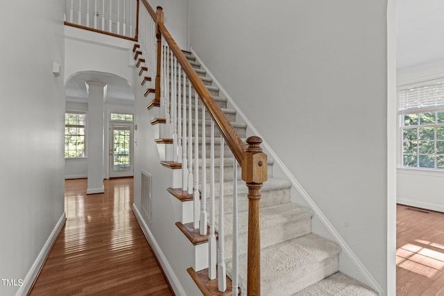 stairway featuring wood-type flooring